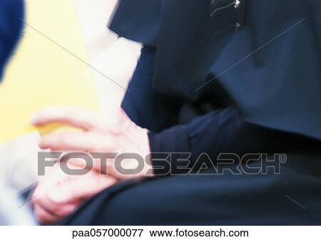 Religious person's hands, blurred View Large Photo Image Stock Photo - Religious person's hands, blurred. Fotosearch