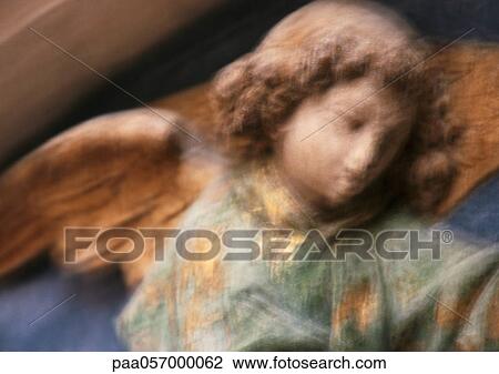 Statue of angel, close-up, blurred View Large Photo Image Stock Image - Statue of angel, close-up, blurred. Fotosearch