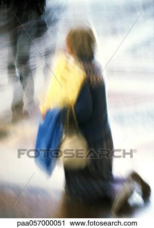 Woman kneeling, blurred View Large Photo Image Stock Image - Woman kneeling, blurred. Fotosearch
