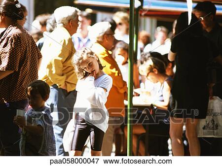 Stock Photo - Crowd in street. Fotosearch
