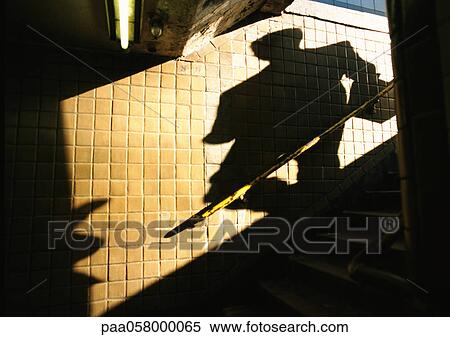 Man's shadow View Large Photo Image Stock Photography - Man's shadow. Fotosearch
