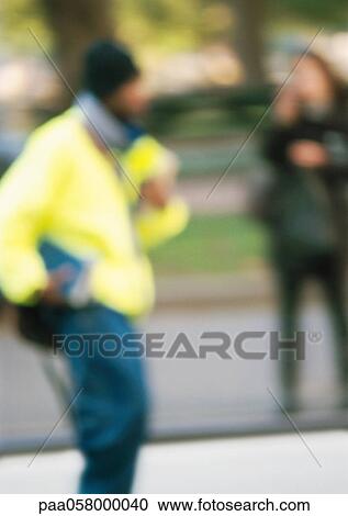 Silhouettes in park, blurred View Large Photo Image Stock Image - Silhouettes in park, blurred. Fotosearch