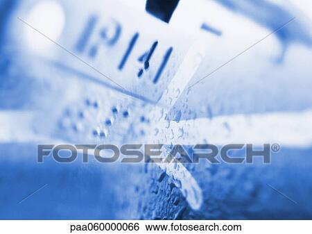 Stock Illustration - Arrow, braille and numbers, composite, close-up. Fotosearch