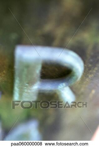Stock Illustration - Letter R, close-up, blurred. Fotosearch