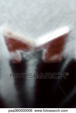 Stock Illustration - M text and shadow, high angle view, blurred. Fotosearch