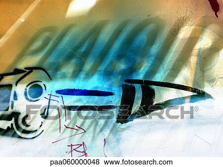 Stock Illustration - Pleasure text in French and drawing of gun and directional arrow, composite, close-up . Fotosearch