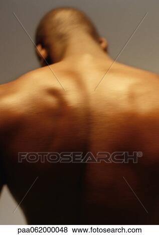 Man's bare back, close up. View Large Photo Image Stock Photo - Man's bare back, close up.. Fotosearch