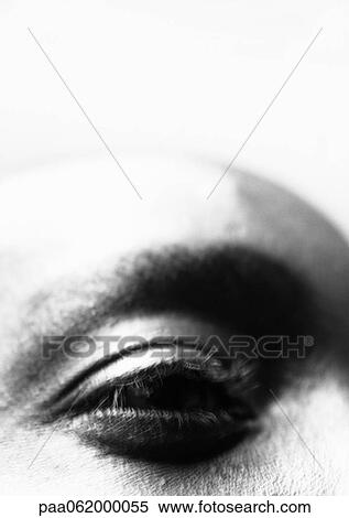 Stock Photography - Man's eye, close up, black and white.. Fotosearch