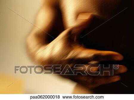 Man's hand on bare chest, close up, blurred. View Large Photo Image Stock Photo - Man's hand on bare chest, close up, blurred.. Fotosearch
