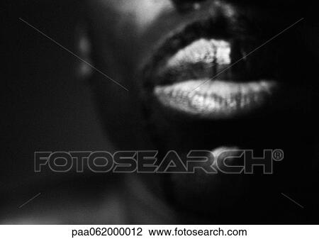 Stock Image - Man's mouth, close up, black and white.. Fotosearch
