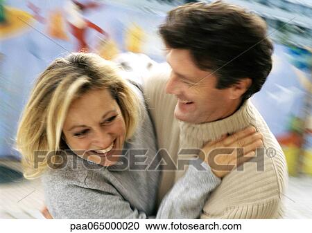 Man and woman holding each other, motion, close up. View Large Photo Image Stock Image - Man and woman holding each other, motion, close up.. Fotosearch