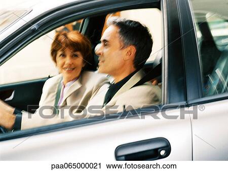 Man and woman in car, blurred View Large Photo Image Stock Image - Man and woman in car, blurred. Fotosearch
