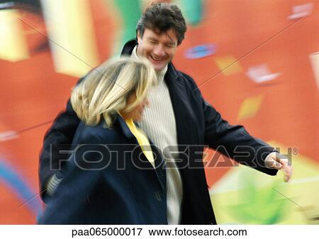 Man and woman walking together, man's arm around woman, blurred View Large Photo Image Stock Photo - Man and woman walking together, man's arm around woman, blurred. Fotosearch