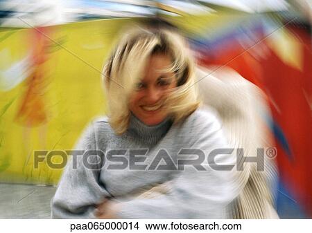 Man holding woman from behind, motion, blurred. View Large Photo Image Picture - Man holding woman from behind, motion, blurred.. Fotosearch