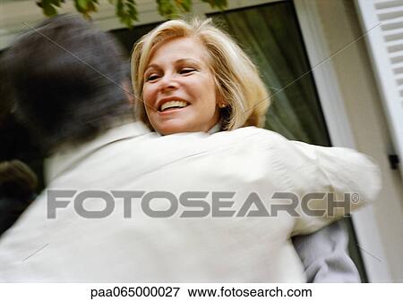 Man hugging woman, rear view, head and shoulders View Large Photo Image Stock Photo - Man hugging woman, rear view, head and shoulders. Fotosearch