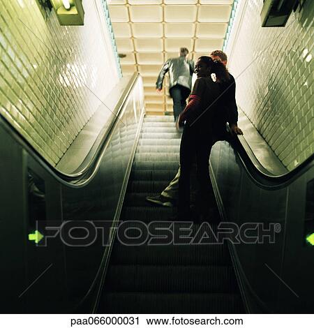 People going up escalator, rear view View Large Photo Image Stock Image - People going up escalator, rear view. Fotosearch