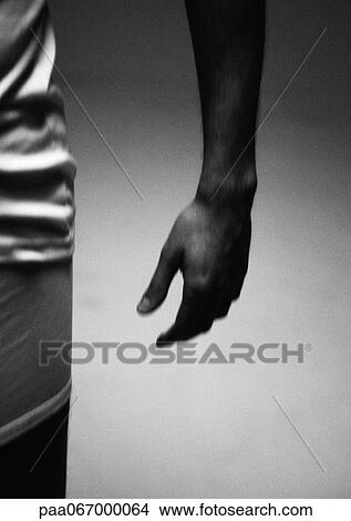 Man's forearm and side, blurred black and white. View Large Photo Image Picture - Man's forearm and side, blurred black and white.. Fotosearch