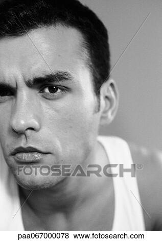 Stock Photo - Man's head, partial view, close-up, black and white.. Fotosearch