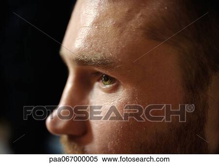 Stock Photography - Partial view of man's face, close up, side view. Fotosearch
