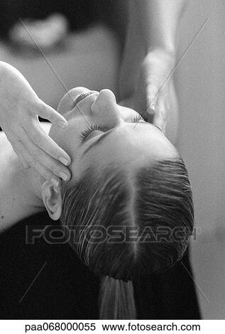 Woman leaning head back with fingers at temples, close-up, black and white. View Large Photo Image Stock Photography - Woman leaning head back with fingers at temples, close-up, black and white.. Fotosearch