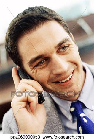 Businessman using cellular phone, close-up, portrait. View Large Photo Image Stock Image - Businessman using cellular phone, close-up, portrait.. Fotosearch