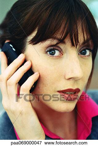 Businesswoman using cellular phone, close-up, portrait. View Large Photo Image Stock Photo - Businesswoman using cellular phone, close-up, portrait.. Fotosearch