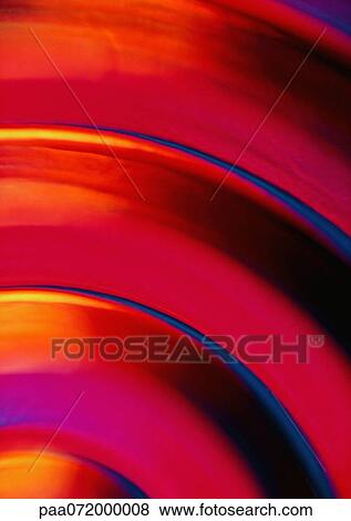 Stock Illustration - Circular light effect, reds and yellows. Fotosearch