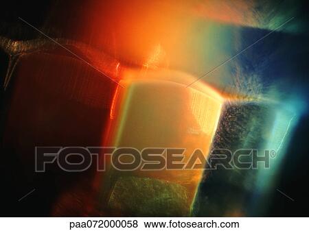 Stock Illustration - Light effect, reds, yellows and blues.. Fotosearch