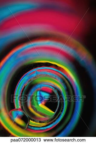 Spiraling light effect, rainbow colors. View Large Illustration Drawing - Spiraling light effect, rainbow colors.. Fotosearch