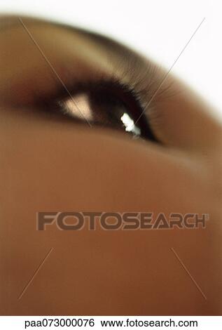 Woman's brown eye, low angle view, close-up View Large Photo Image Stock Photograph - Woman's brown eye, low angle view, close-up. Fotosearch
