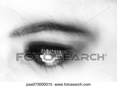 Stock Photography - Woman's eye, blurred close up, black and white.. Fotosearch