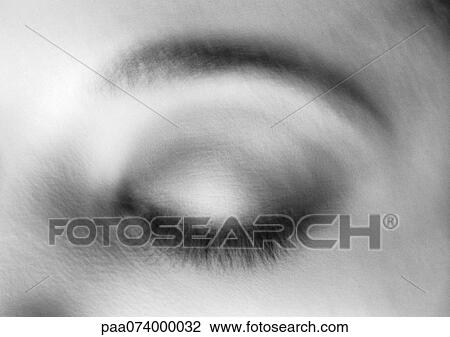 Stock Image - Woman's closed eye, close-up, blurry, black and white.. Fotosearch