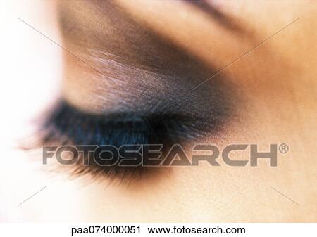 Woman's closed eye with eye shadow, extreme close-up View Large Photo Image Stock Image - Woman's closed eye with eye shadow, extreme close-up. Fotosearch