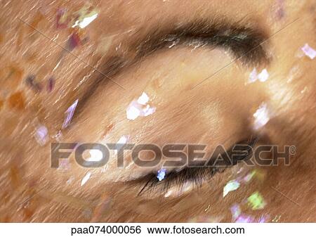 Woman's closed eye with glitter on face, close-up, blurry. View Large Photo Image Stock Photograph - Woman's closed eye with glitter on face, close-up, blurry.. Fotosearch