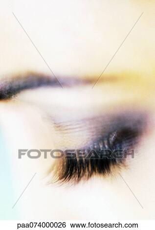 Stock Photograph - Woman's closed eye with make-up, close-up. Fotosearch