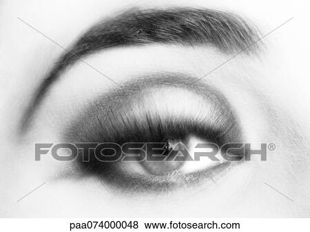 Stock Photo - Woman's made-up eye, close-up, blurry, black and white.. Fotosearch