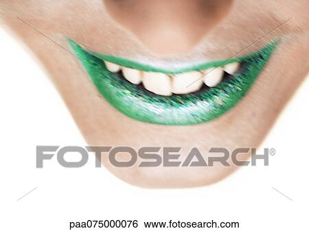 Woman wearing green lipstick, close up of smiling mouth, high angle view View Large Photo Image Stock Photograph - Woman wearing green lipstick, close up of smiling mouth, high angle view. Fotosearch