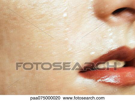 Woman wearing red lipstick, close up of open mouth and wet skin, cropped, blurred. View Large Photo Image Stock Image - Woman wearing red lipstick, close up of open mouth and wet skin, cropped, blurred.. Fotosearch