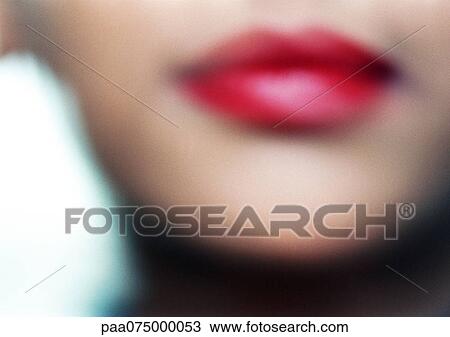 Woman wearing red lipstick, close up of lower face, blurred. View Large Photo Image Stock Image - Woman wearing red lipstick, close up of lower face, blurred.. Fotosearch