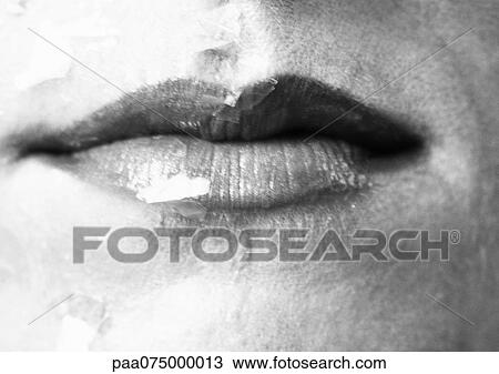 Stock Image - Woman's mouth, close up, black and white.. Fotosearch