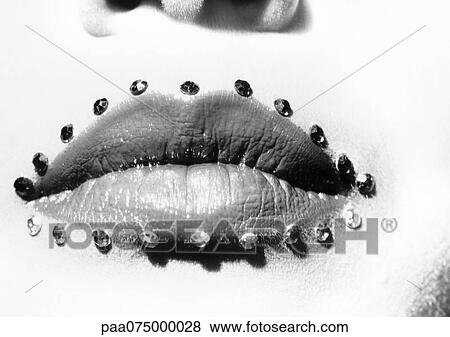 Woman's mouth with jewel adornment, close up, black and white. View Large Photo Image Stock Photo - Woman's mouth with jewel adornment, close up, black and white. . Fotosearch