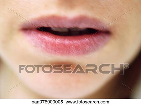 Stock Photography - Close up of woman's mouth, blurred. Fotosearch