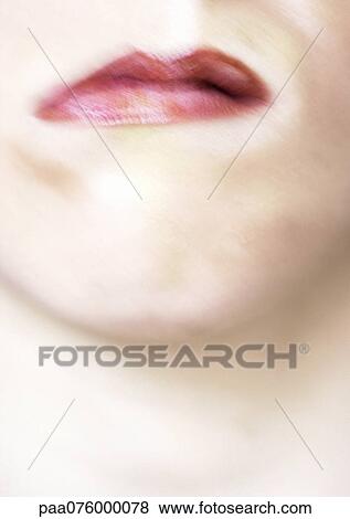 Stock Photo - Close up of woman's mouth, blurry.. Fotosearch