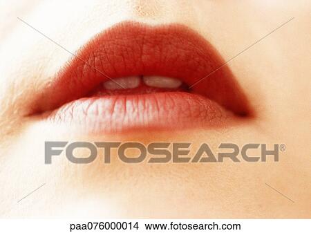 Picture - Close up of woman's mouth, lips parted. Fotosearch