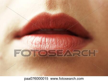 Stock Photography - Close up of woman's mouth, lips parted. Fotosearch