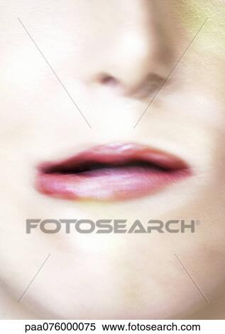 Close up of woman's mouth making expression, blurry. View Large Photo Image Stock Photography - Close up of woman's mouth making expression, blurry.. Fotosearch