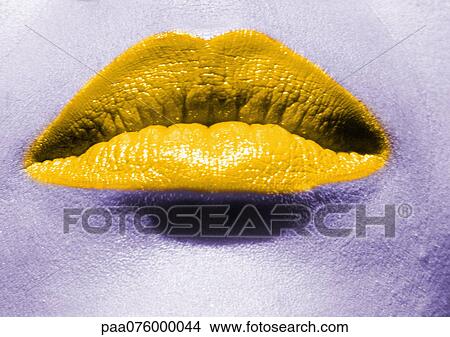 Close up of woman's mouth with yellow lipstick. View Large Photo Image Picture - Close up of woman's mouth with yellow lipstick.. Fotosearch