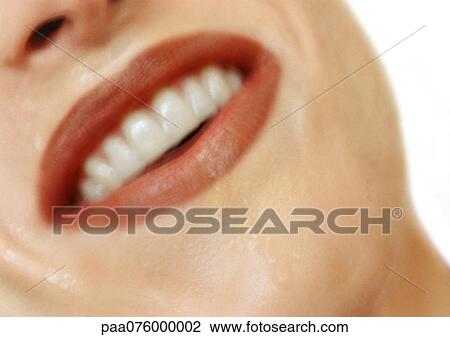 Woman smiling, close-up of mouth and wet skin View Large Photo Image Stock Image - Woman smiling, close-up of mouth and wet skin. Fotosearch