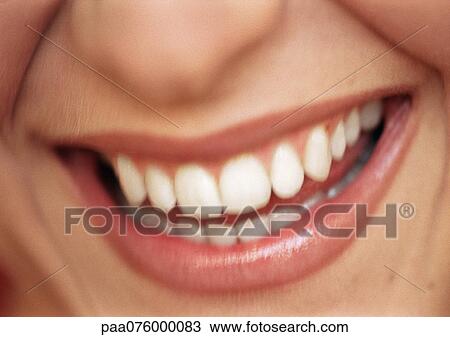 Woman's open mouth smiling and lower part of nose, close-up, blurred View Large Photo Image Stock Image - Woman's open mouth smiling and lower part of nose, close-up, blurred. Fotosearch