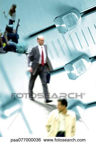 Stock Photograph - Businessman walking next to control levers, montage. Fotosearch
